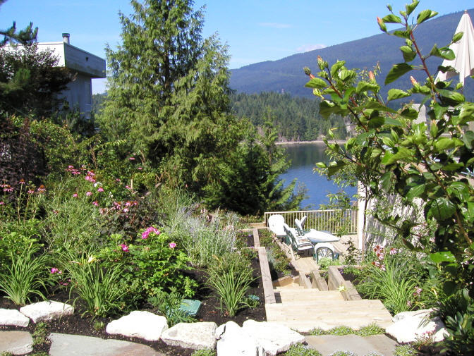 A finished Belcarra garden with an inlet view; the Glendon Biofilter field beneath it is completely hidden.