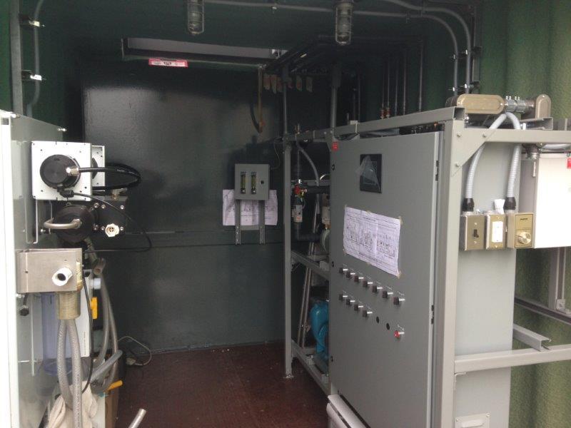 Inside a Torak MBR container: control cabinet, valve manifold and pumps.